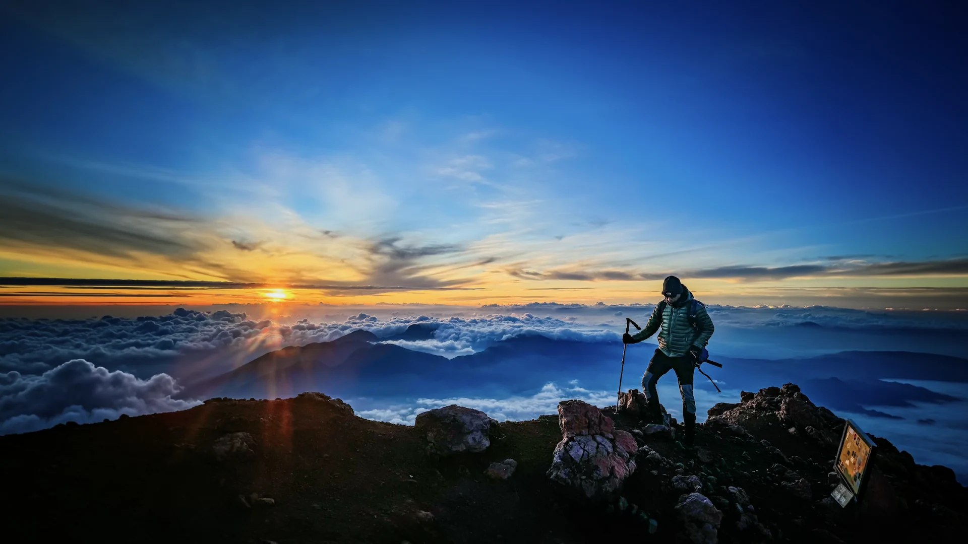 The breathtaking sunrise view from the summit of Mount Kerinci, the highest volcano in Southeast Asia, guided by Kerinci Paradise